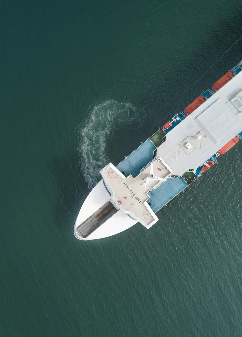 Container cargo ship crossing open water